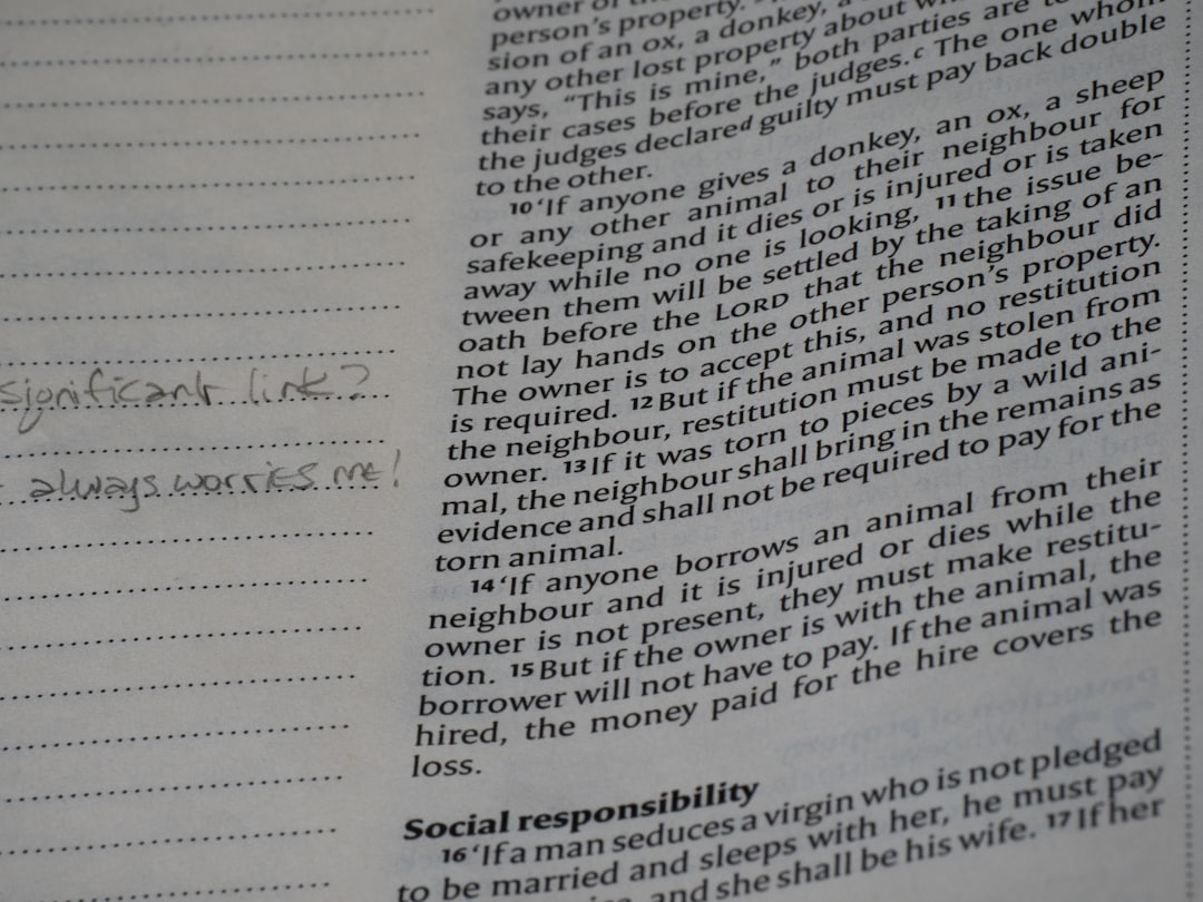 Image of a property manager reviewing documents with a slight smile